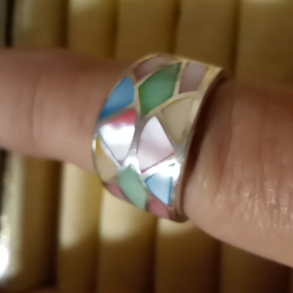 sterling Jewelry - Mother of pearl ring multi color segmented in sterling silver .